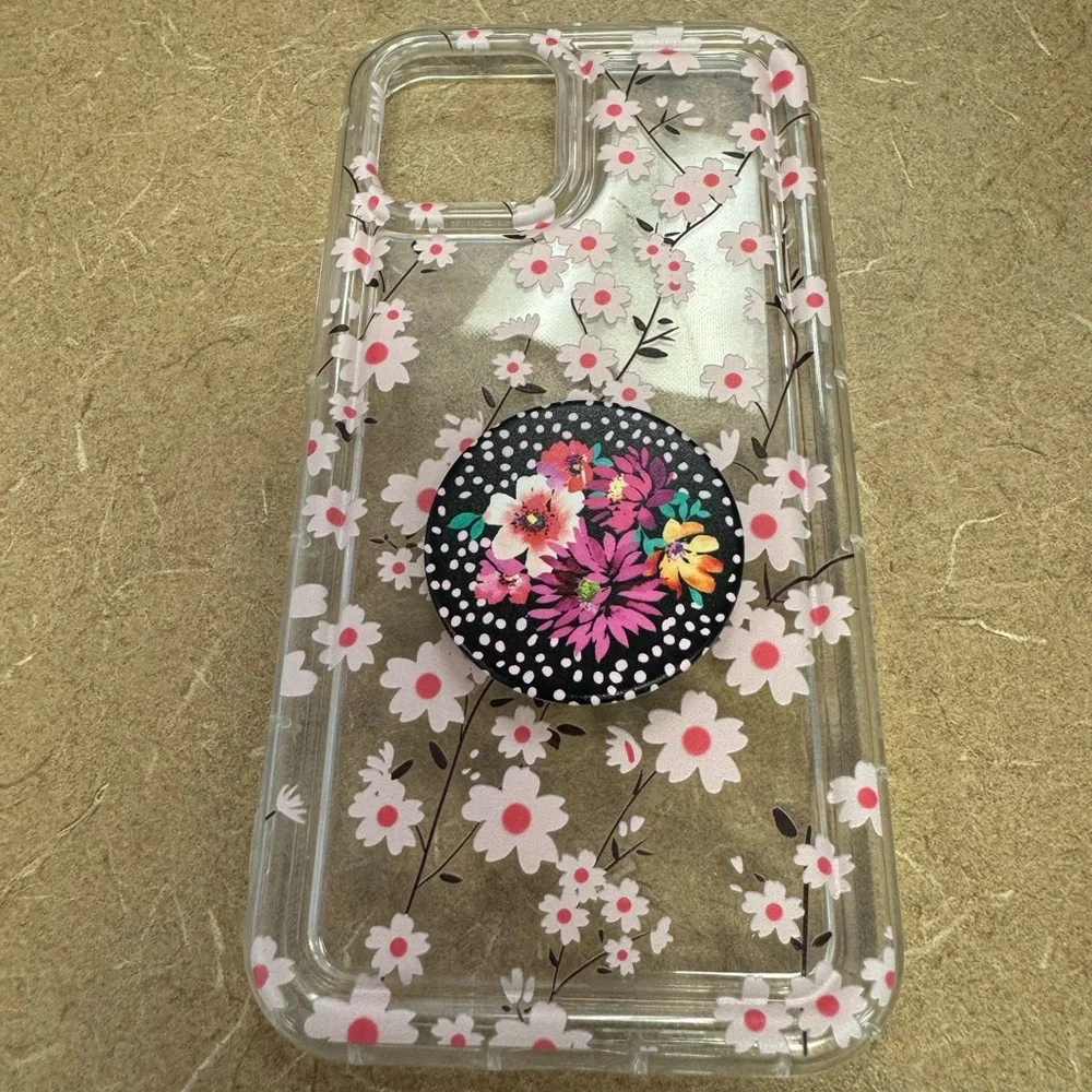 iPhone 12 Pro with pop socket.
